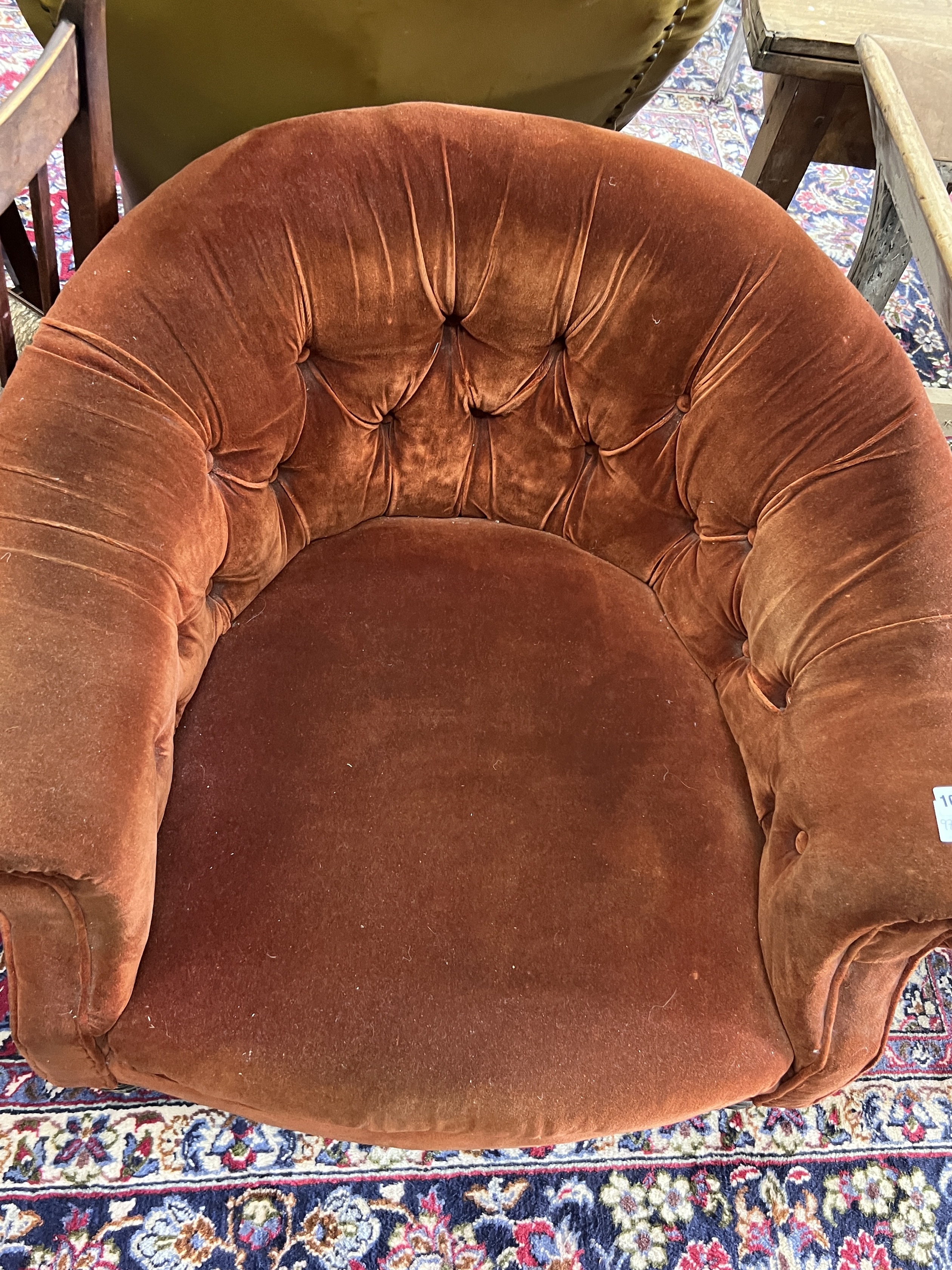 A Victorian tub framed armchair upholstered in buttoned fabric, width 82cm, depth 74cm, height 70cm